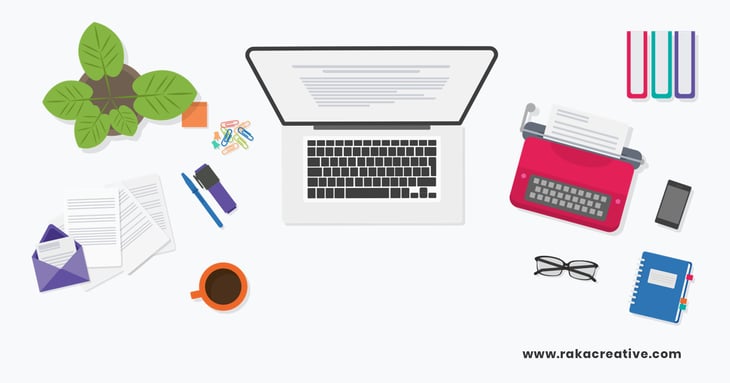 An illustration of a journalist's desk, featuring a laptop, typewriter, and writing utensils