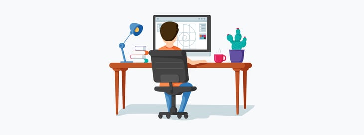 Marketer creating an animation on a desktop monitor. 