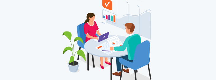 Two colleges collaborating and reviewing their HubSpot audit to enhance their marketing strategies.