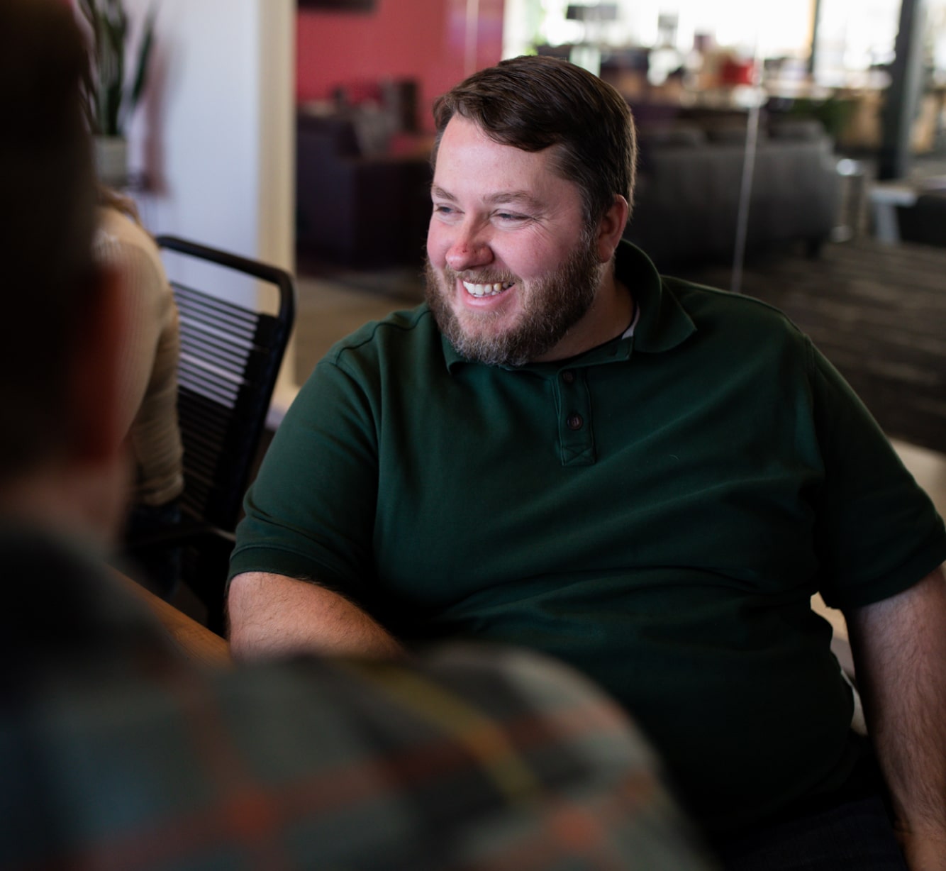 aaron-smiling-in-meeting