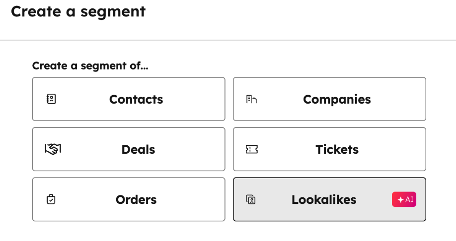 The HubSpot "Create a Segment" menu showing options based on demographic, firmographic, or lookalike data
