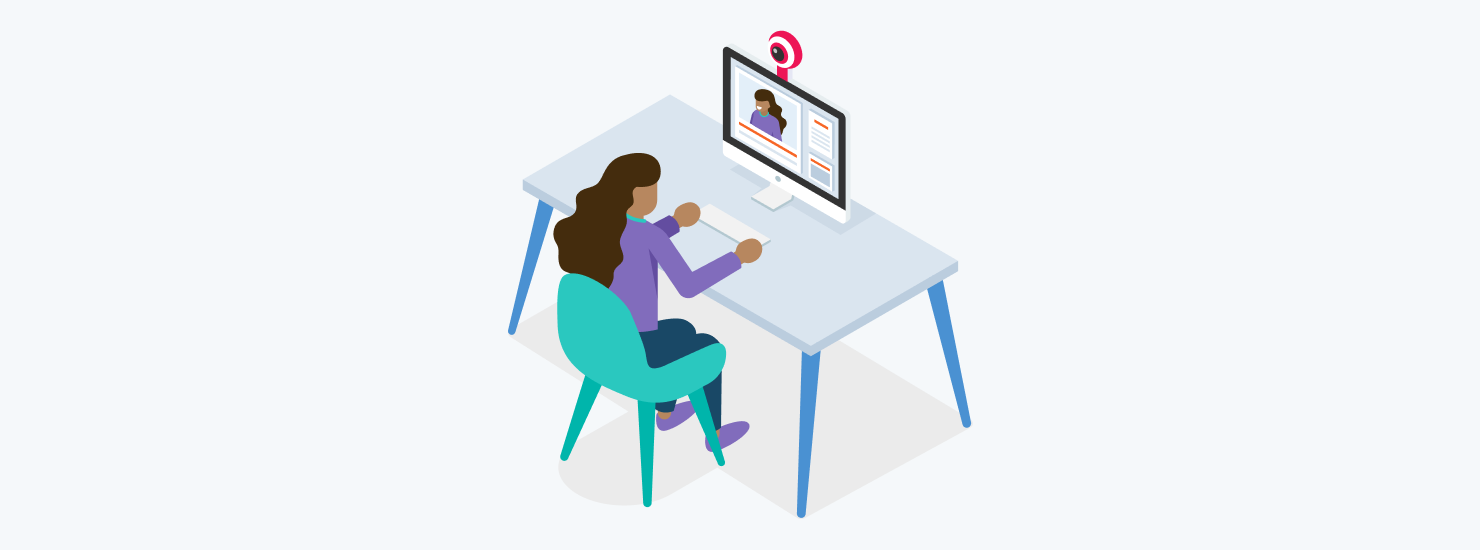 Marketer working remotely at a desk, recording a professional marketing video.